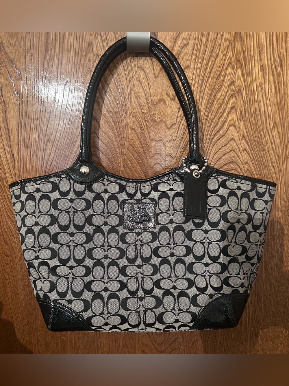 Coach Bleecker Signature black and gray canvas tote with patent leather trim